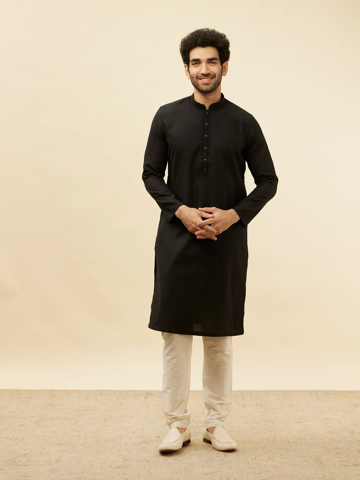 alt message - Manyavar Men Coal Black Embellished Neckline Kurta Set image number 2