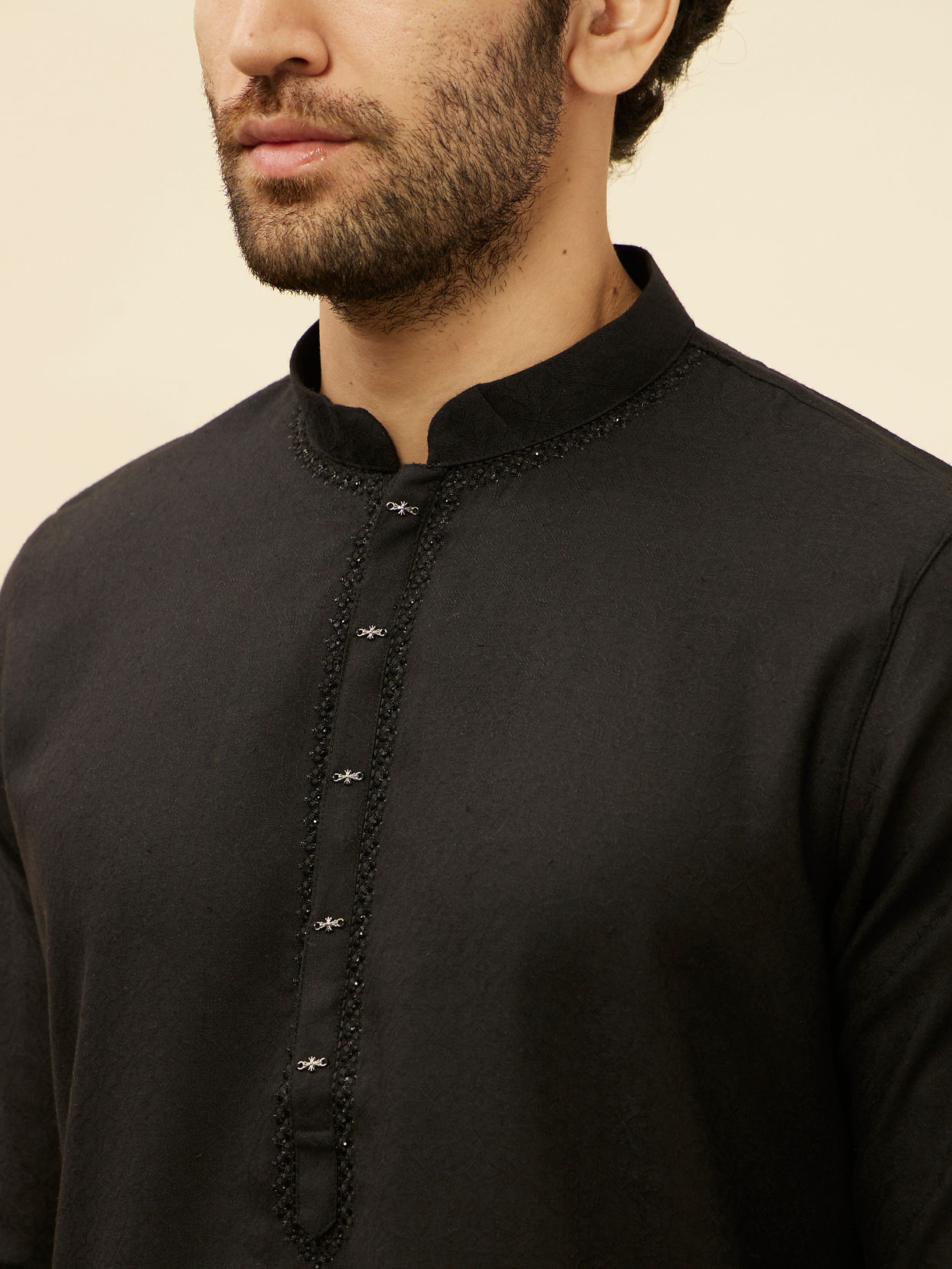 alt message - Manyavar Men Coal Black Embellished Neckline Kurta Set image number 1