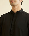 alt message - Manyavar Men Black Solid Minimalist Kurta Pajama image number 1