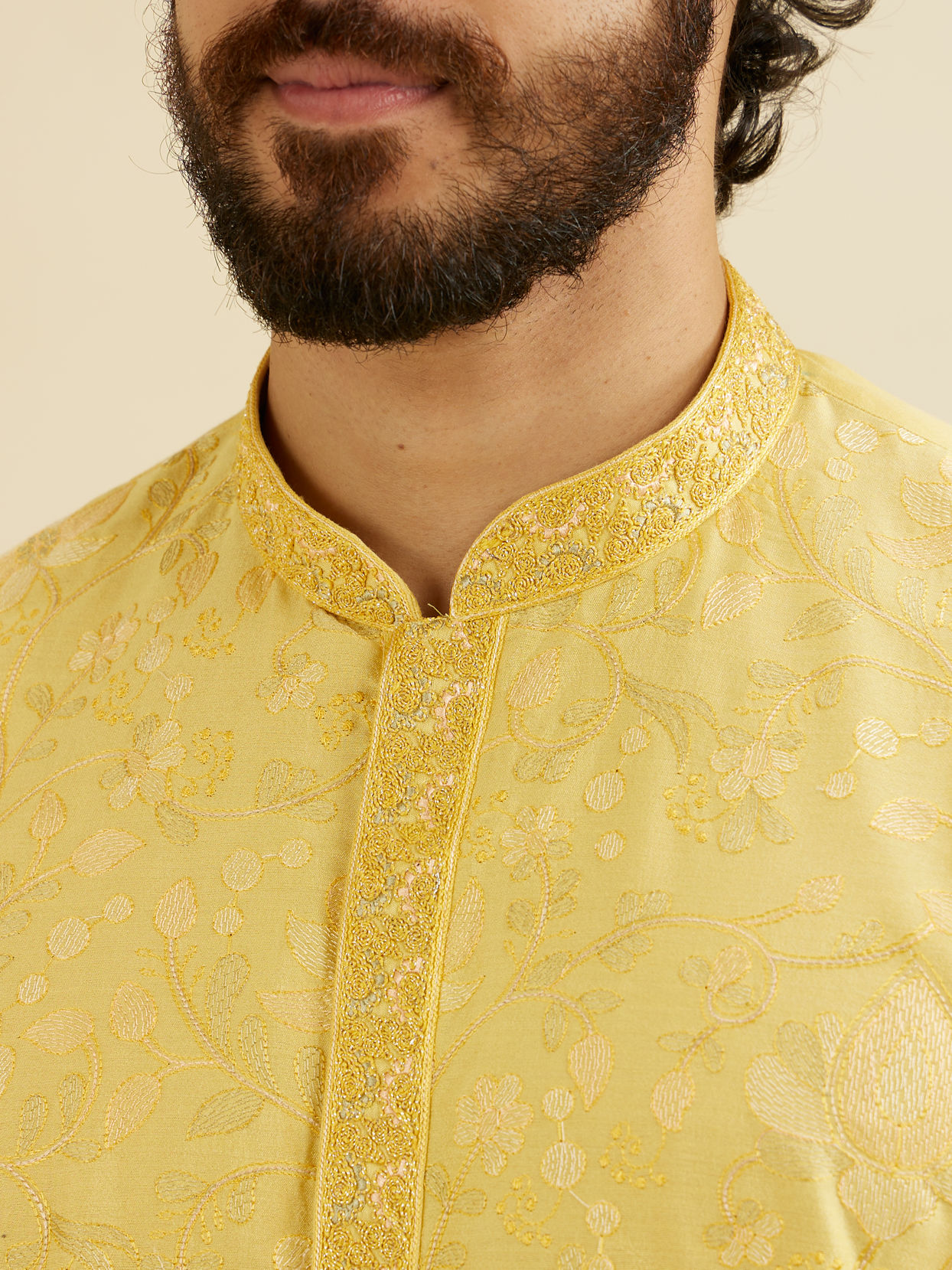 alt message - Manyavar Men Buttercup Yellow Bel Buti Patterned Kurta Set image number 1