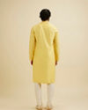 alt message - Manyavar Men Buttercup Yellow Bel Buti Patterned Kurta Set image number 5