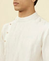 alt message - Manyavar Men Warm White Side Open Kurta Set image number 1