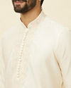 Manyavar Men Coconut Cream Embroidered Neckline Kurta Set