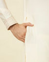 Manyavar Men Coconut Cream Embroidered Neckline Kurta Set