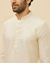 alt message - Manyavar Men Off White Plain Kurta Pajama image number 1