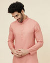 alt message - Manyavar Men Burnt Pink Self Patterned Kurta Set image number 0