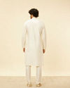 alt message - Manyavar Men Pristine White Self Patterned Kurta Set image number 5