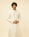 Pristine White Self Patterned Kurta Set