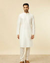 alt message - Manyavar Men White Self Patterned Kurta Set image number 2