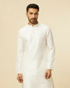 alt message - Manyavar Men White Self Patterned Kurta Set image number 0