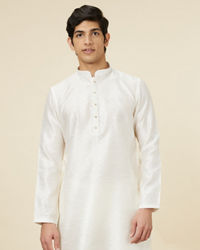 alt message - Manyavar Men Embellished Warm White Kurta Pajama image number 0