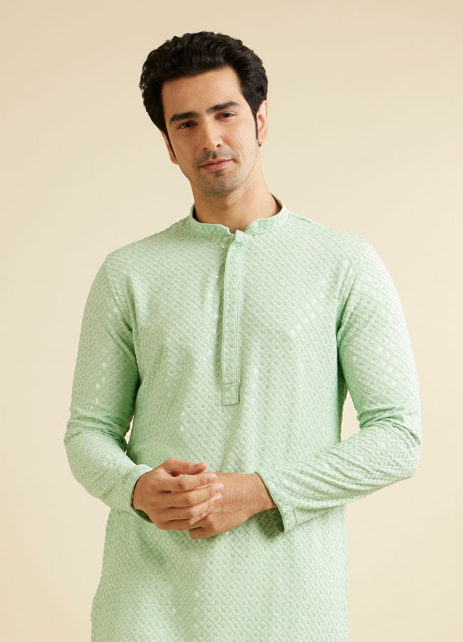 alt message - Manyavar Men Light Mid Green Chikankari Embroidered Sequinned Kurta Set image number 0