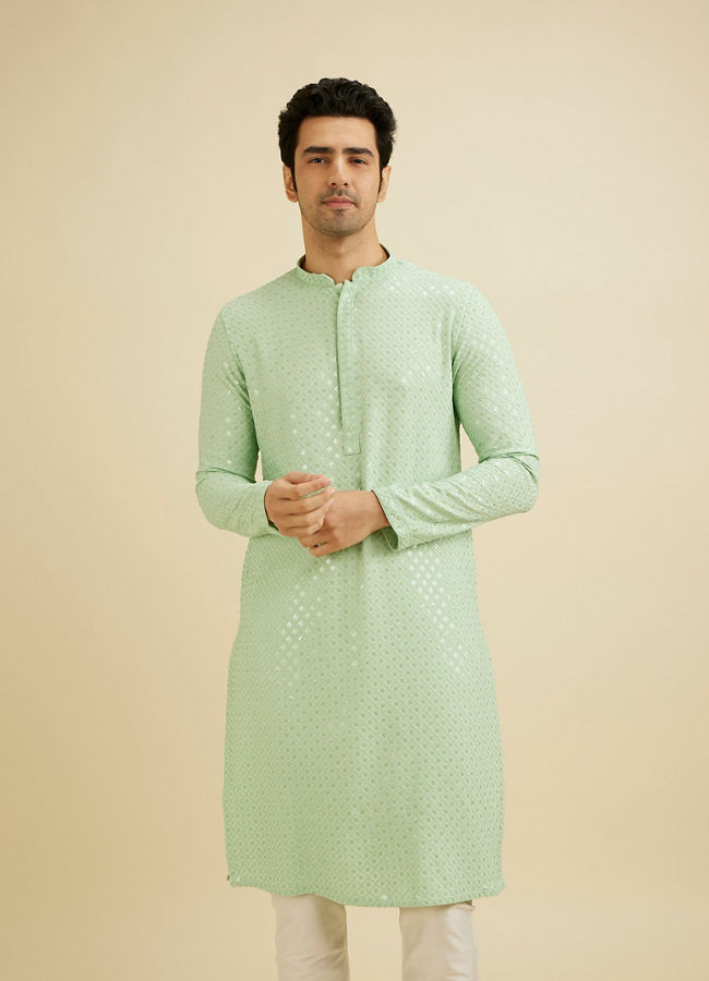 alt message - Manyavar Men Light Mid Green Chikankari Embroidered Sequinned Kurta Set image number 0