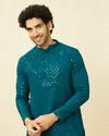 alt message - Manyavar Men Teal Blue Chikankari Patterned Kurta Set image number 0