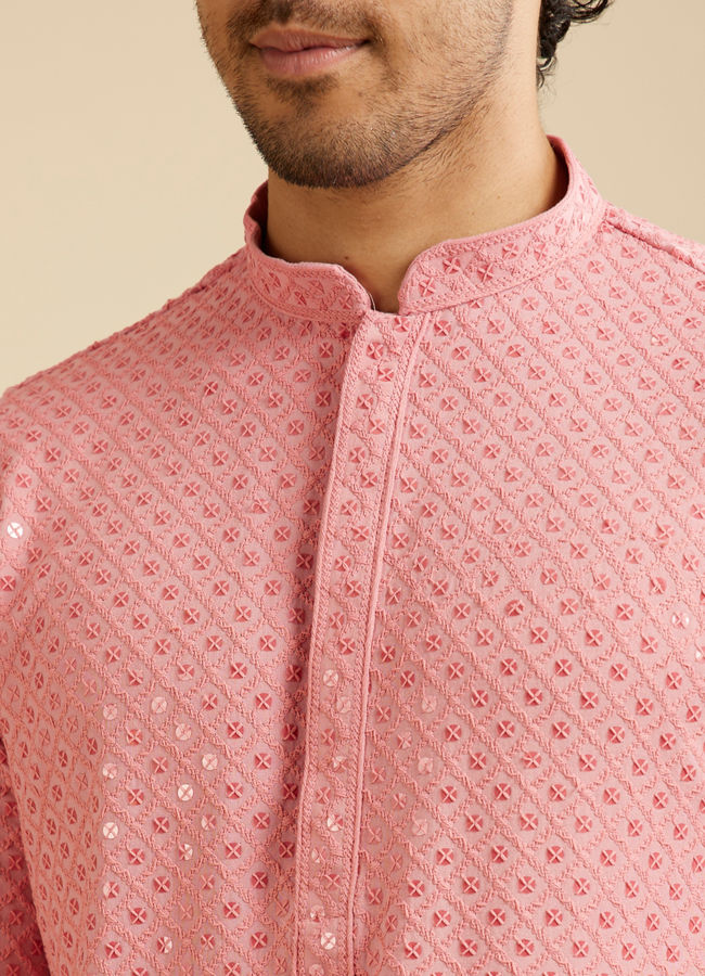 alt message - Manyavar Men Coral Pink Chikankari Embroidered Sequinned Kurta Set image number 1