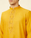 alt message - Manyavar Men Sunrise Yellow Kurta Set with Embroidered Placket image number 1