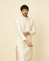 alt message - Manyavar Men Cream Grid Patterned Kurta Set image number 0