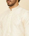 alt message - Manyavar Men Cream Grid Patterned Kurta Set image number 1