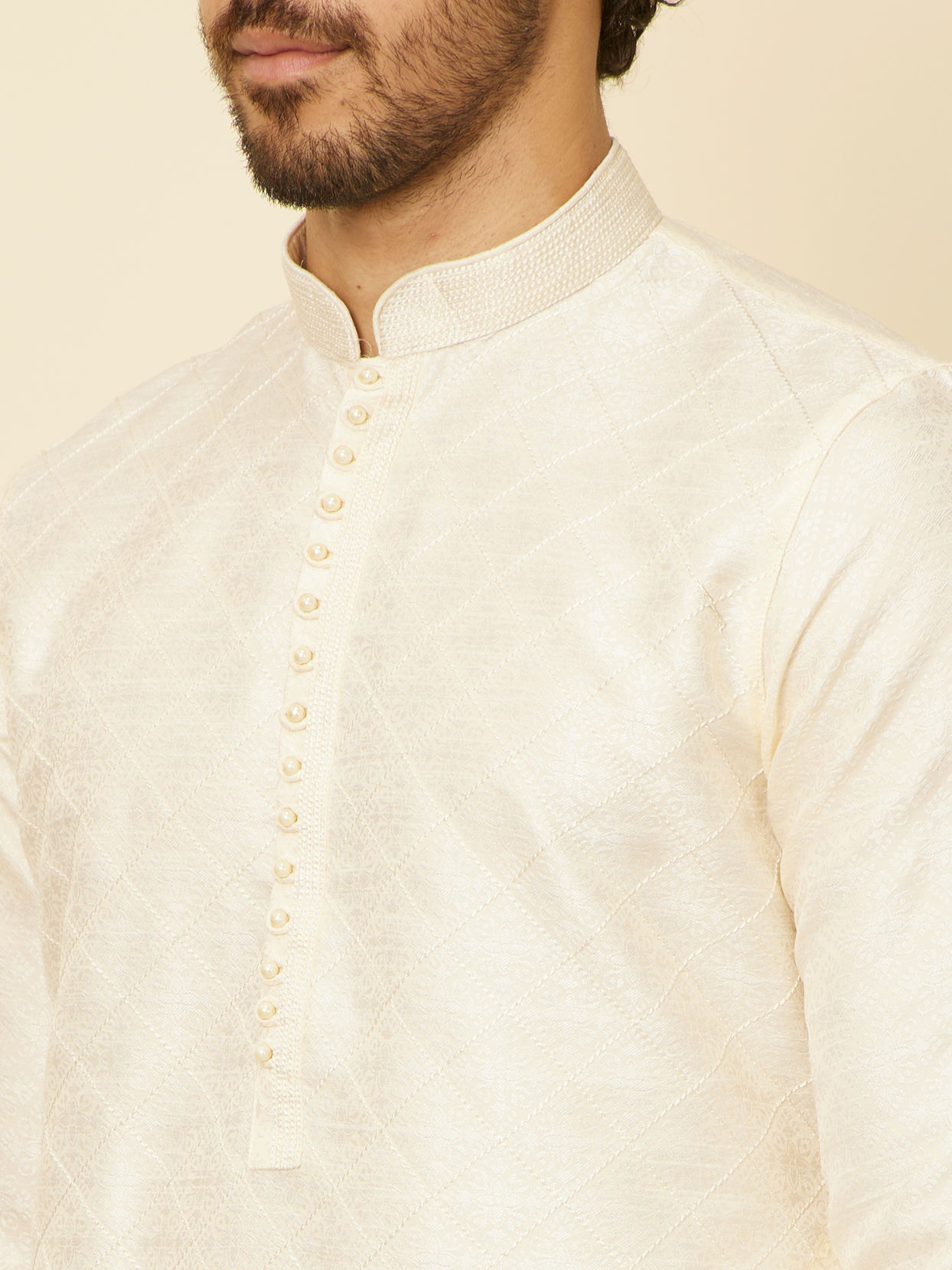 alt message - Manyavar Men Cream Grid Patterned Kurta Set image number 1