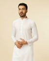 alt message - Manyavar Men White String Patterned Kurta Set image number 0