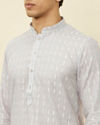 alt message - Manyavar Men Cloud Grey String Patterned Kurta Set image number 1