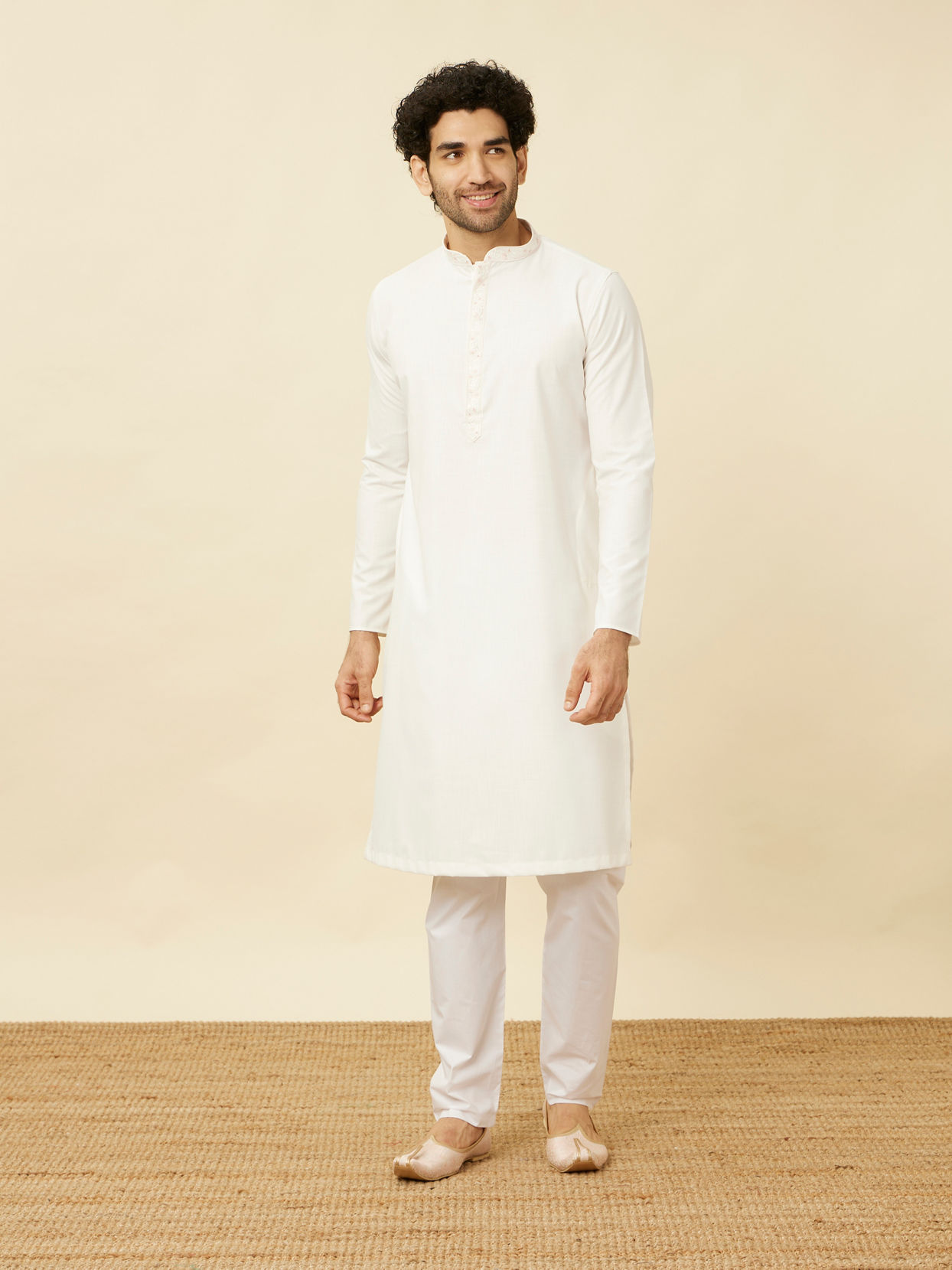 Manyavar Men Pristine White Kurta Set with Embroidered Placket and Neckline