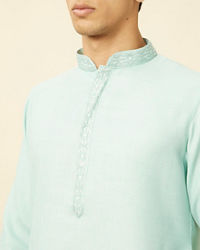 Manyavar Men Tropical Blue Embroidered Neckline Kurta Set