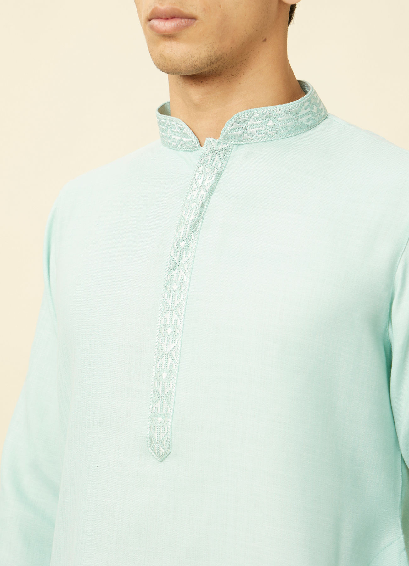 Manyavar Men Tropical Blue Embroidered Neckline Kurta Set