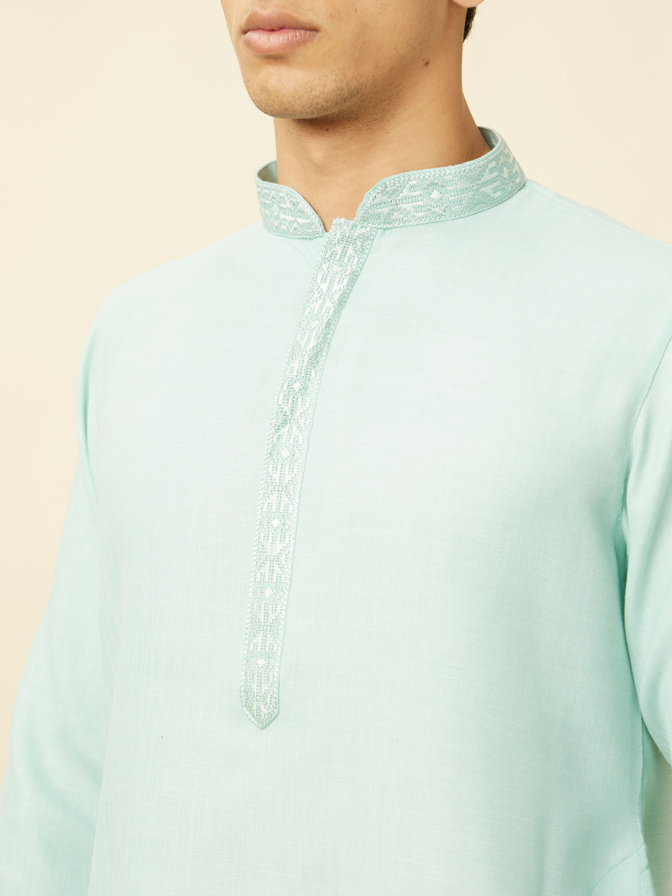 Manyavar Men Tropical Blue Embroidered Neckline Kurta Set
