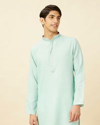 Manyavar Men Tropical Blue Embroidered Neckline Kurta Set