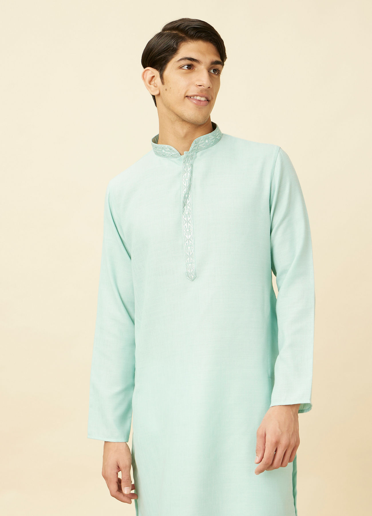 Manyavar Men Tropical Blue Embroidered Neckline Kurta Set