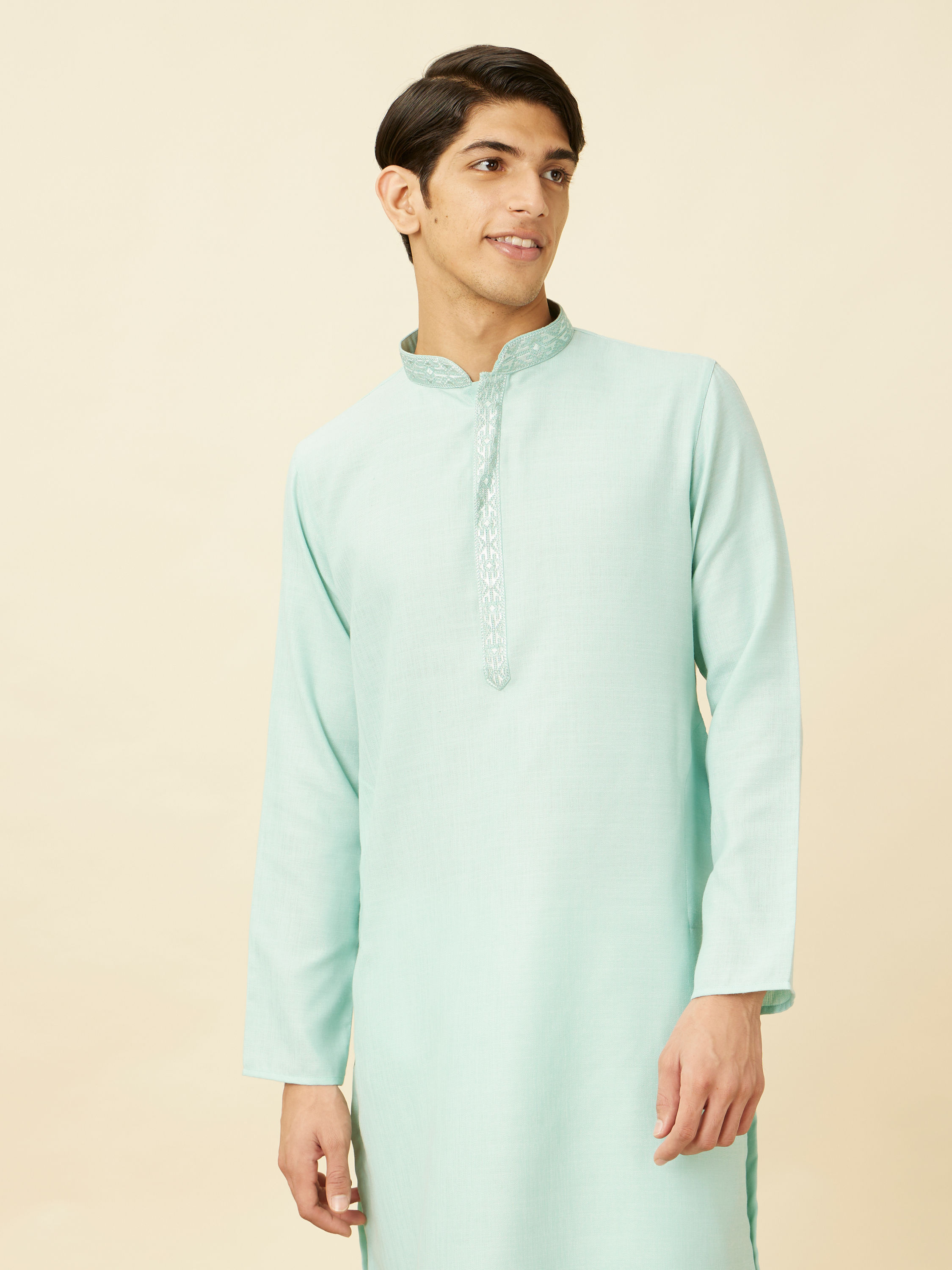 Manyavar Men Tropical Blue Embroidered Neckline Kurta Set