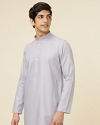 alt message - Manyavar Men Pastel Purple Self Patterned Kurta Set image number 0