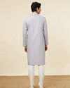 Manyavar Men Pastel Purple Self Patterned Kurta Set