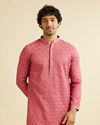 alt message - Manyavar Men Coral Red Jaal Patterned Kurta Set with Rhinestones image number 0