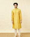 alt message - Manyavar Men Amber Yellow Kurta Set with Floral Embroidered Neckline image number 2