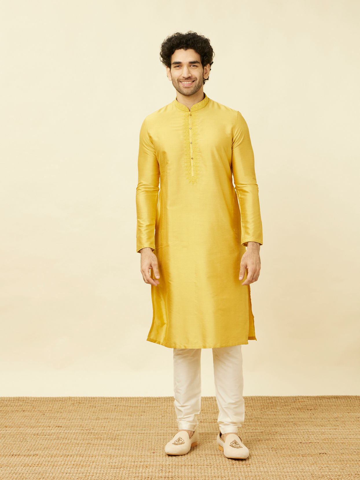 alt message - Manyavar Men Amber Yellow Kurta Set with Floral Embroidered Neckline image number 2