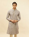 alt message - Manyavar Men Light Purple Jaal Printed Kurta Set image number 0