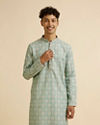 alt message - Manyavar Men Light Mid Green Medallion Patterned Kurta Set image number 0