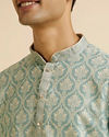 alt message - Manyavar Men Light Mid Green Medallion Patterned Kurta Set image number 1