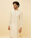 alt message - Manyavar Men Warm Cream Sequin Speckled Kurta Set image number 0