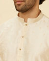 alt message - Manyavar Men Warm Cream Sequin Speckled Kurta Set image number 1