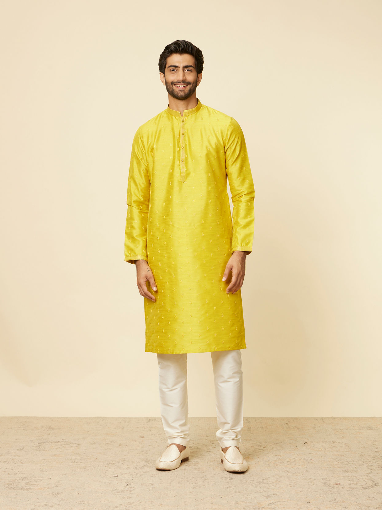 alt message - Manyavar Men Mustard Yellow Ditsy Floral Printed Kurta Set image number 2