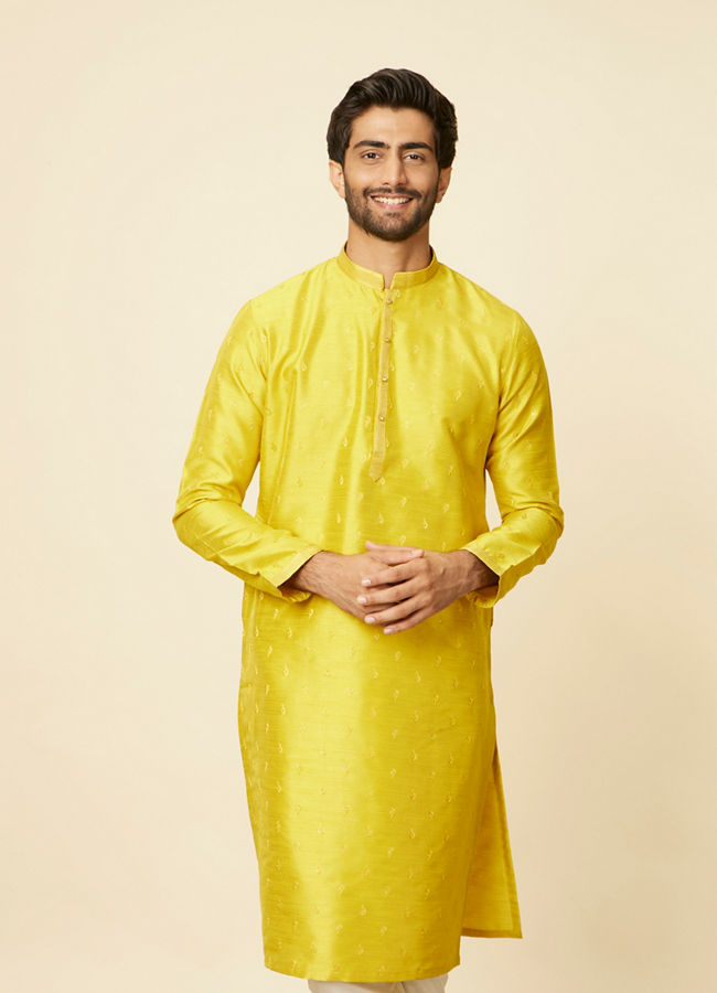 alt message - Manyavar Men Mustard Yellow Ditsy Floral Printed Kurta Set image number 0