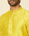 alt message - Manyavar Men Mustard Yellow Ditsy Floral Printed Kurta Set image number 1