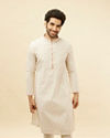 Manyavar Men White and Coral Pink Floral Motif Kurta Set image number 0