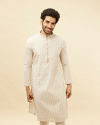 Manyavar Men White and Coral Pink Floral Motif Kurta Set