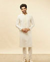 Manyavar Men Pearl White Bel Buti Embroidered Kurta Set