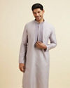 alt message - Manyavar Men Lilac Stripped Kurta Set with Sequins Work image number 0