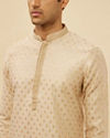 alt message - Manyavar Men Golden Beige Buta Patterned Kurta Set image number 1